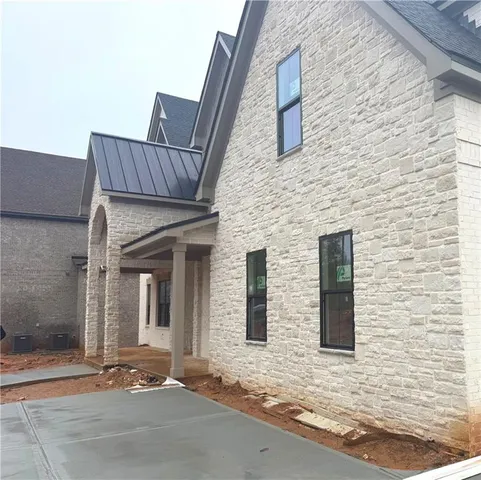 a large white building with a white roof
