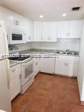 $250,000 | 20 Northwest 87th Avenue, Unit A214, Miami, FL 33172