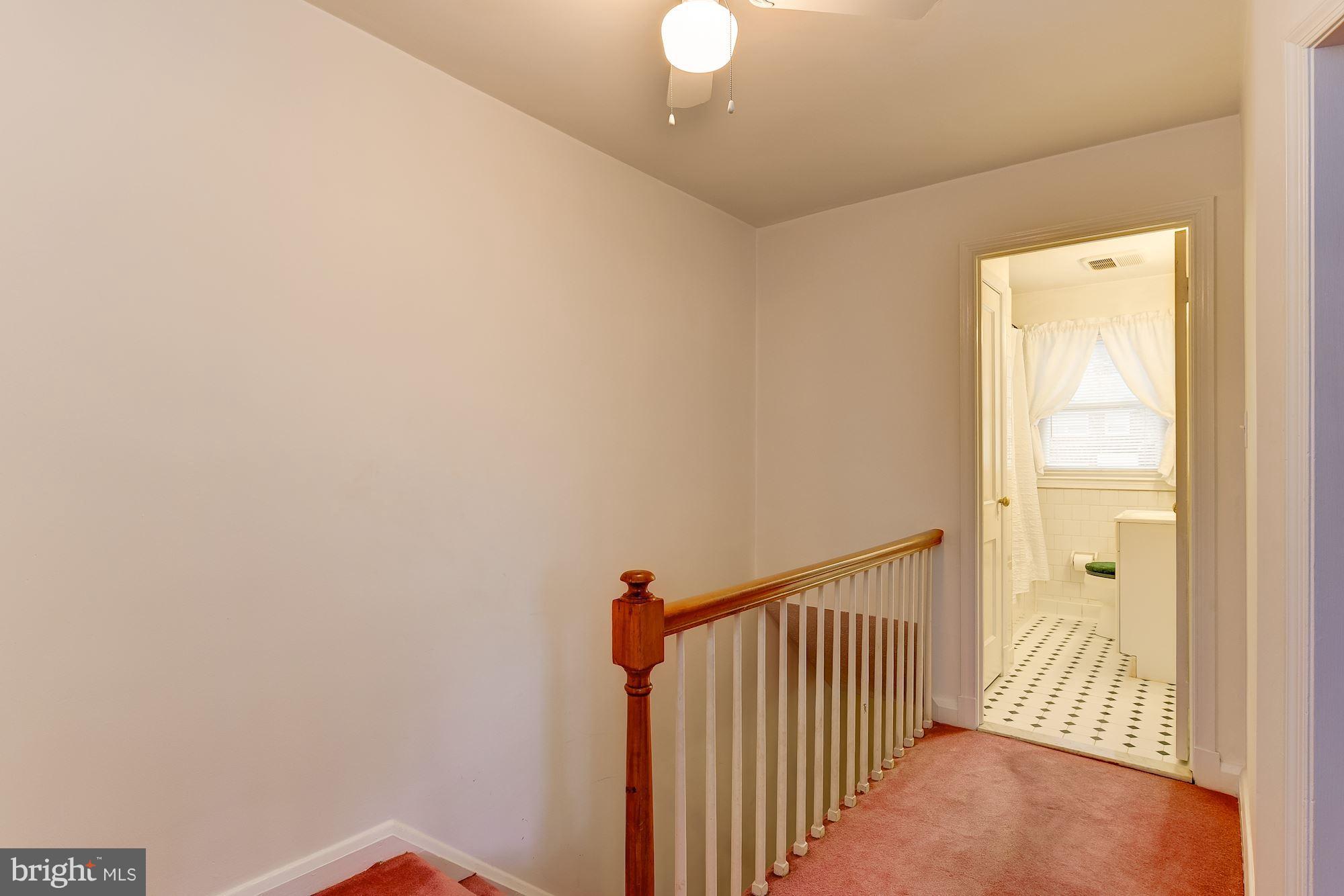 1500 Langford Road Baltimore, MD 21207 - Photo 23 of 30 Interior upper level, wood floors under the carpet