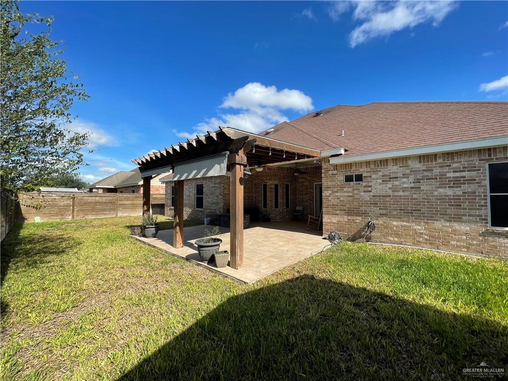 1000 South Flag Street Pharr, TX 78577 - Photo 18 of 24 a view of a backyard with plants and a patio