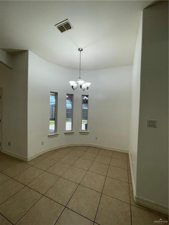 1000 South Flag Street Pharr, TX 78577 - Photo 10 of 24 an empty room with windows