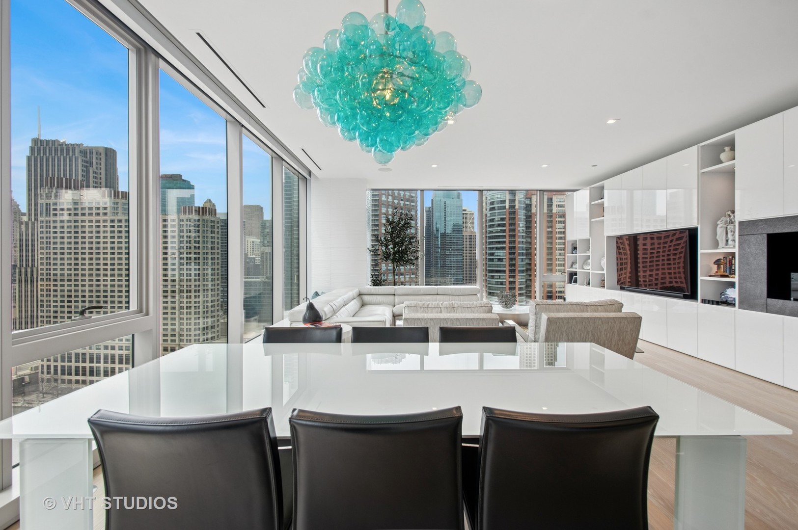 363 East Wacker Drive, Unit 1302 Chicago, IL 60601 - Photo 4 of 31 a kitchen with a sink and a large window