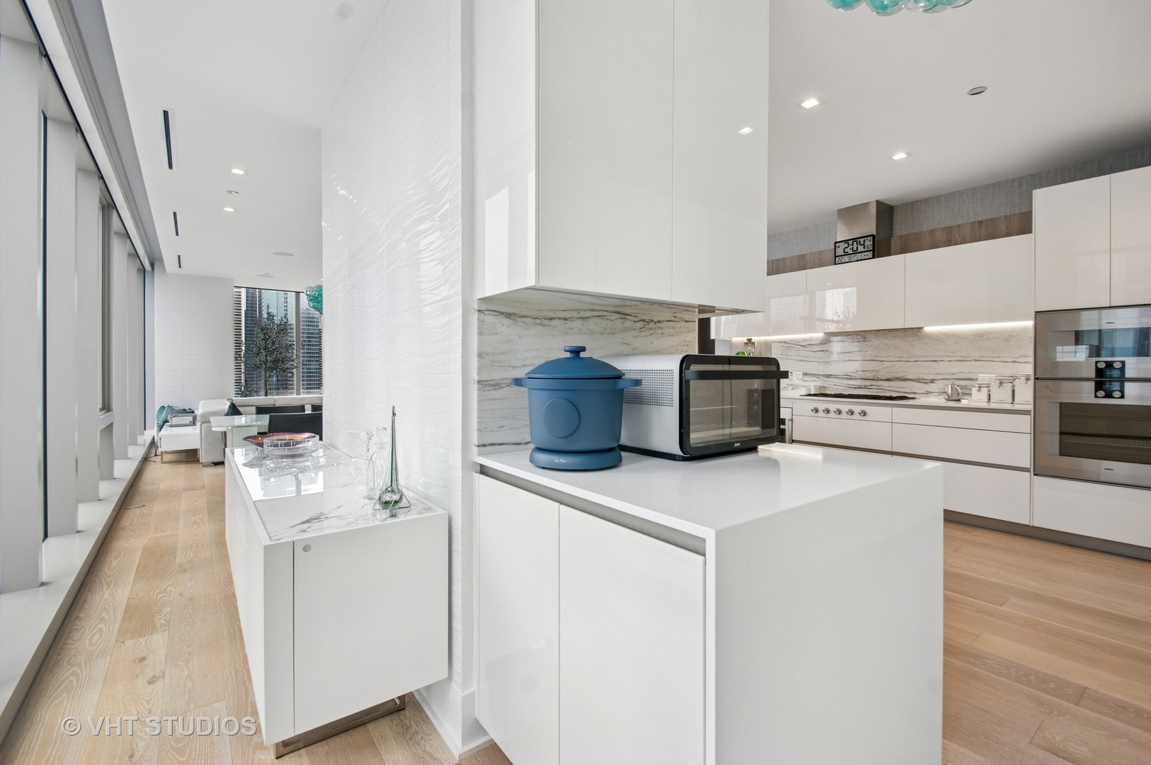 363 East Wacker Drive, Unit 1302 Chicago, IL 60601 - Photo 9 of 31 a kitchen with stainless steel appliances a stove and cabinets