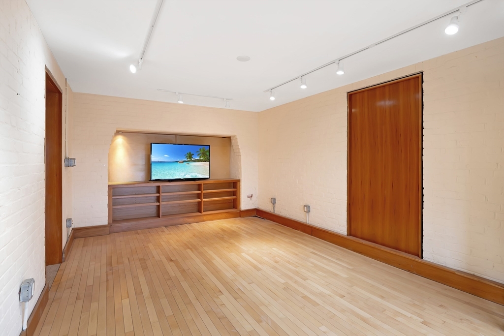 61 Crescent Street, Unit 8 Northampton, MA 01060 - Photo 16 of 30 a view of a livingroom with wooden floor
