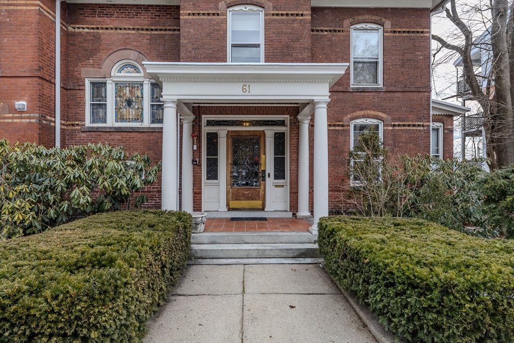 61 Crescent Street, Unit 8 Northampton, MA 01060 - Photo 2 of 30 a front view of a house with garden