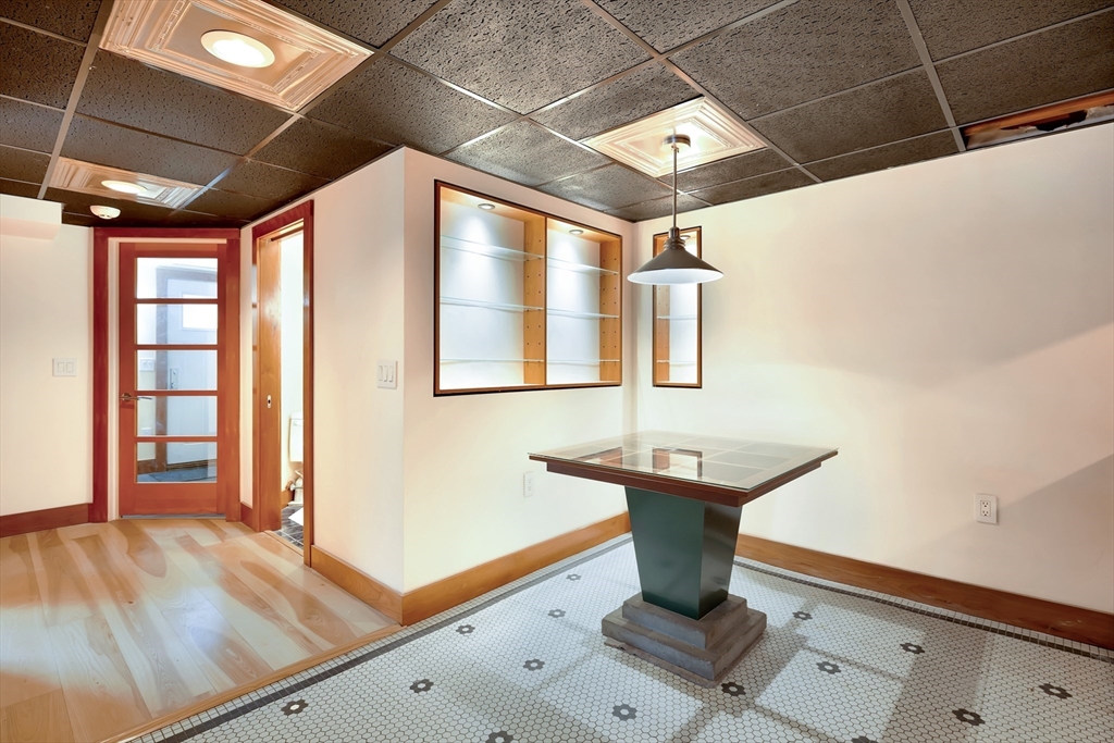 61 Crescent Street, Unit 8 Northampton, MA 01060 - Photo 24 of 30 a bathroom with a sink and mirror