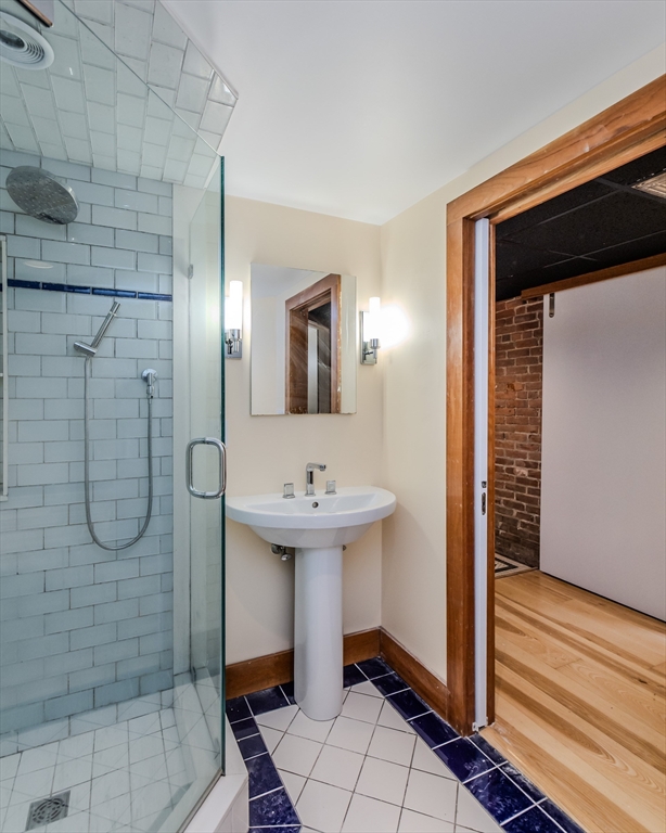 61 Crescent Street, Unit 8 Northampton, MA 01060 - Photo 30 of 30 a bathroom with a sink a toilet and shower