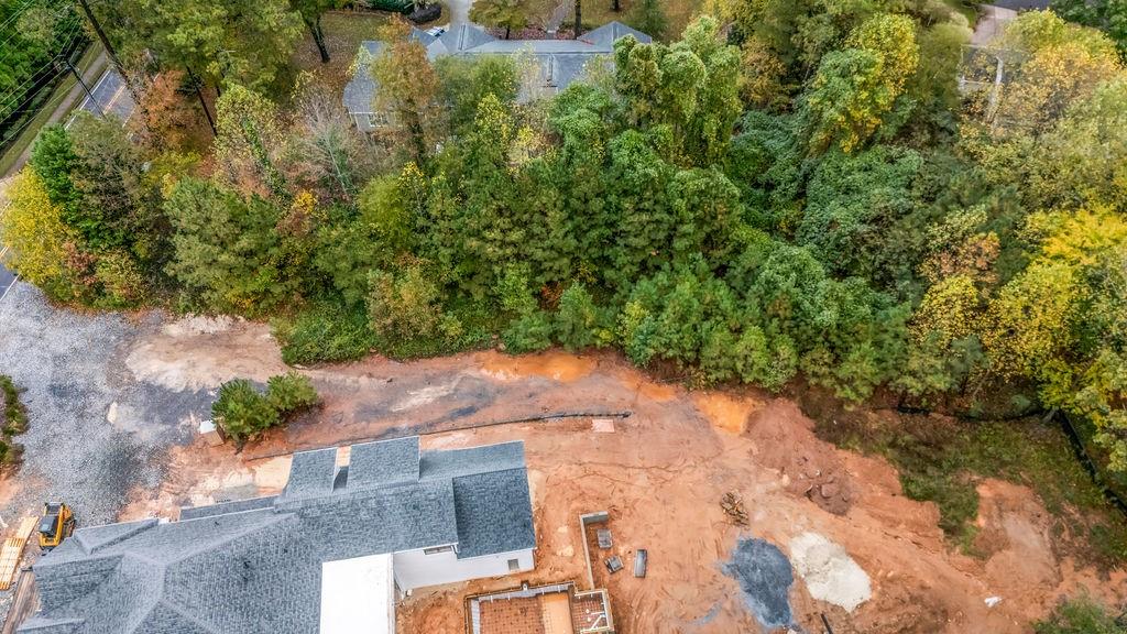 5150 Timber Ridge Road Marietta, GA 30068 - Photo 11 of 24 a view of a yard with plants and a bench
