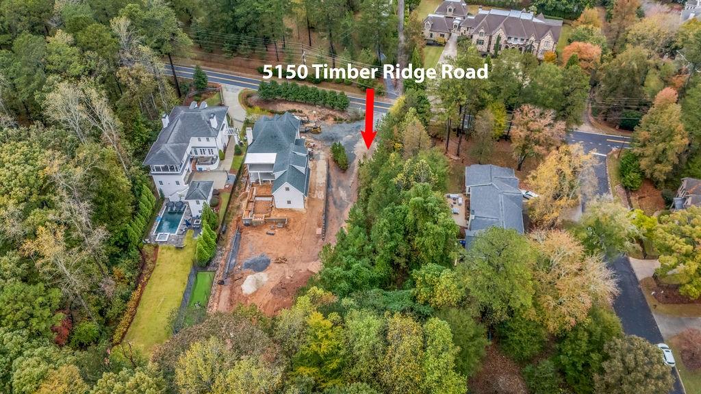5150 Timber Ridge Road Marietta, GA 30068 - Photo 12 of 24 an aerial view of residential house with outdoor space and swimming pool