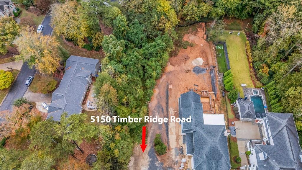 5150 Timber Ridge Road Marietta, GA 30068 - Photo 2 of 24 an aerial view of residential house with outdoor space and trees all around
