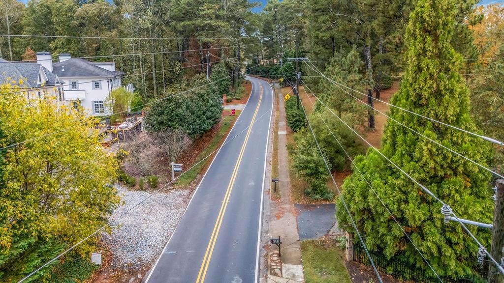 5150 Timber Ridge Road Marietta, GA 30068 - Photo 23 of 24 a view of a yard with plants and wooden fence