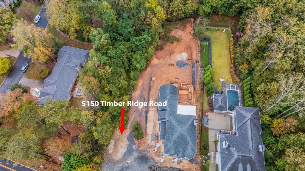 5150 Timber Ridge Road Marietta, GA 30068 - Photo 3 of 24 an aerial view of houses with outdoor space