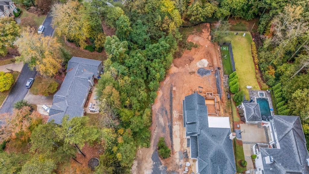 5150 Timber Ridge Road Marietta, GA 30068 - Photo 4 of 24 an aerial view of residential house with outdoor space and trees all around