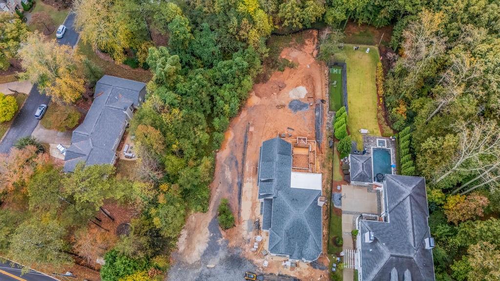 5150 Timber Ridge Road Marietta, GA 30068 - Photo 5 of 24 an aerial view of residential houses with outdoor space and trees