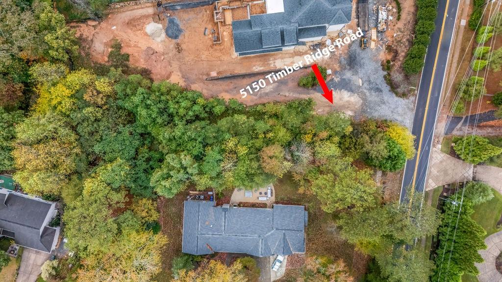 5150 Timber Ridge Road Marietta, GA 30068 - Photo 9 of 24 an aerial view of a house with a yard
