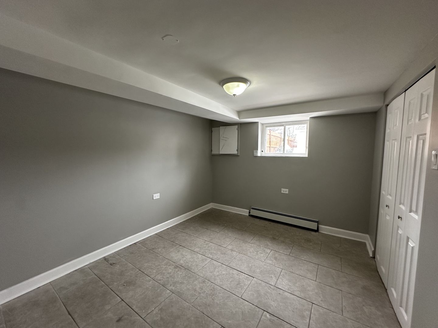 6549 South Keeler Avenue Chicago, IL 60629 - Photo 14 of 16 an empty room with a empty space and windows