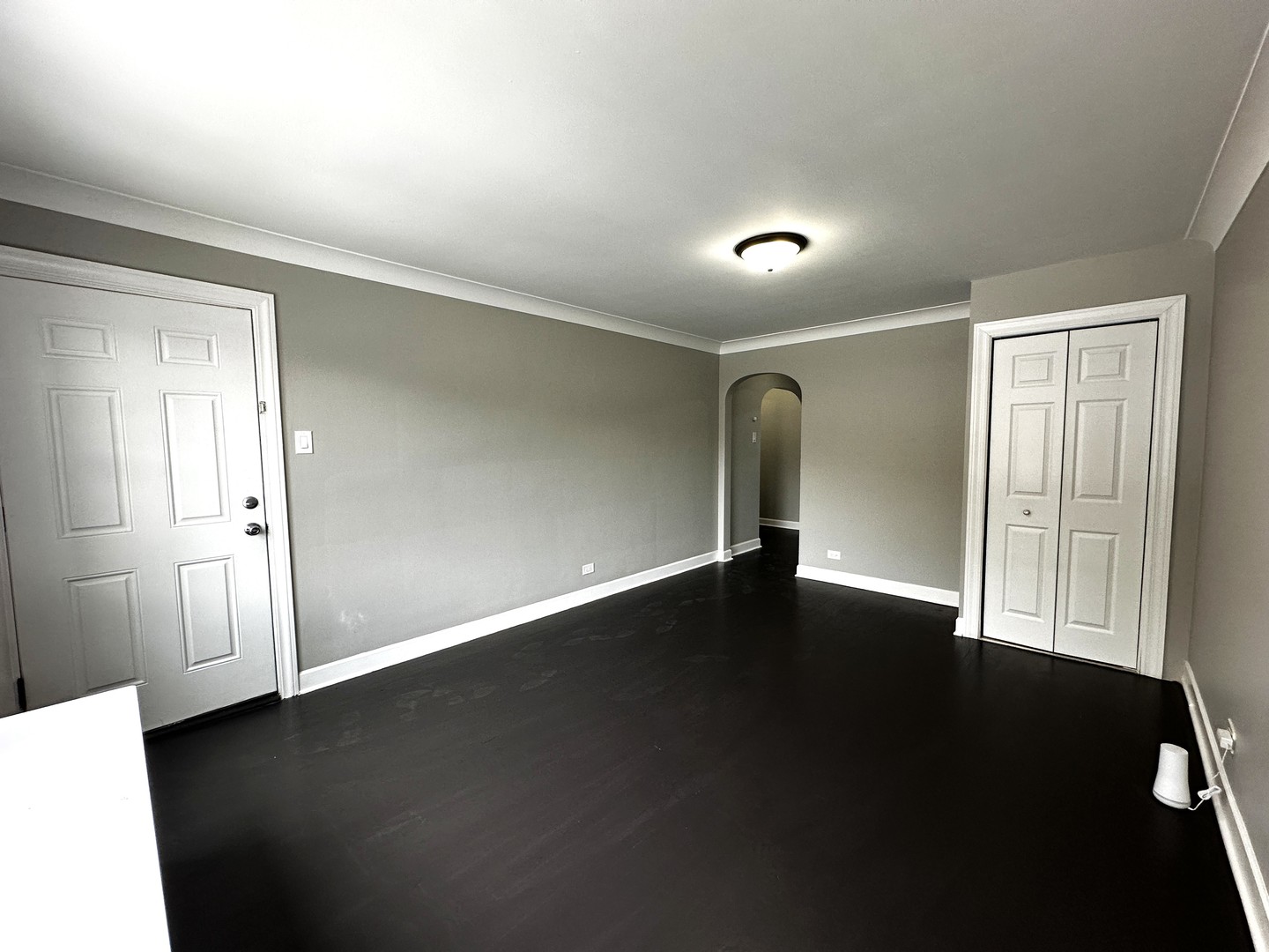 6549 South Keeler Avenue Chicago, IL 60629 - Photo 10 of 16 a view of an empty room with wooden floor