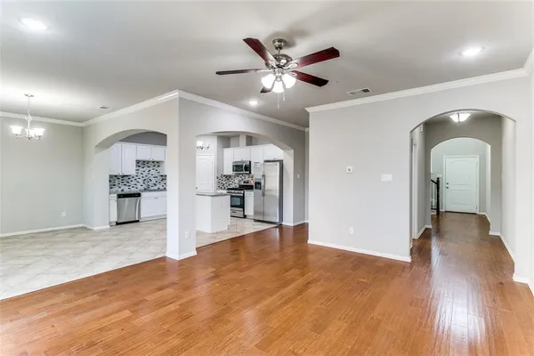 a view of a livingroom with a kitchen