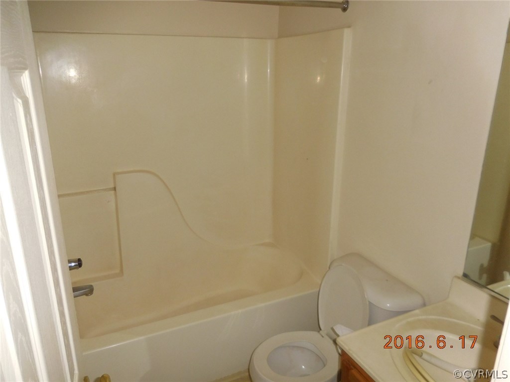 3829 Goodell Road Richmond, VA 23223 - Photo 8 of 11 a bathroom with a toilet and a shower