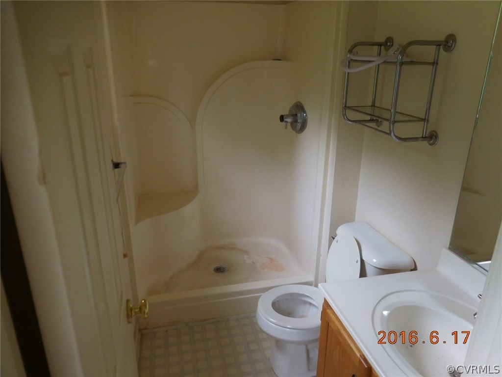 3829 Goodell Road Richmond, VA 23223 - Photo 10 of 11 a bathroom with a sink and a toilet
