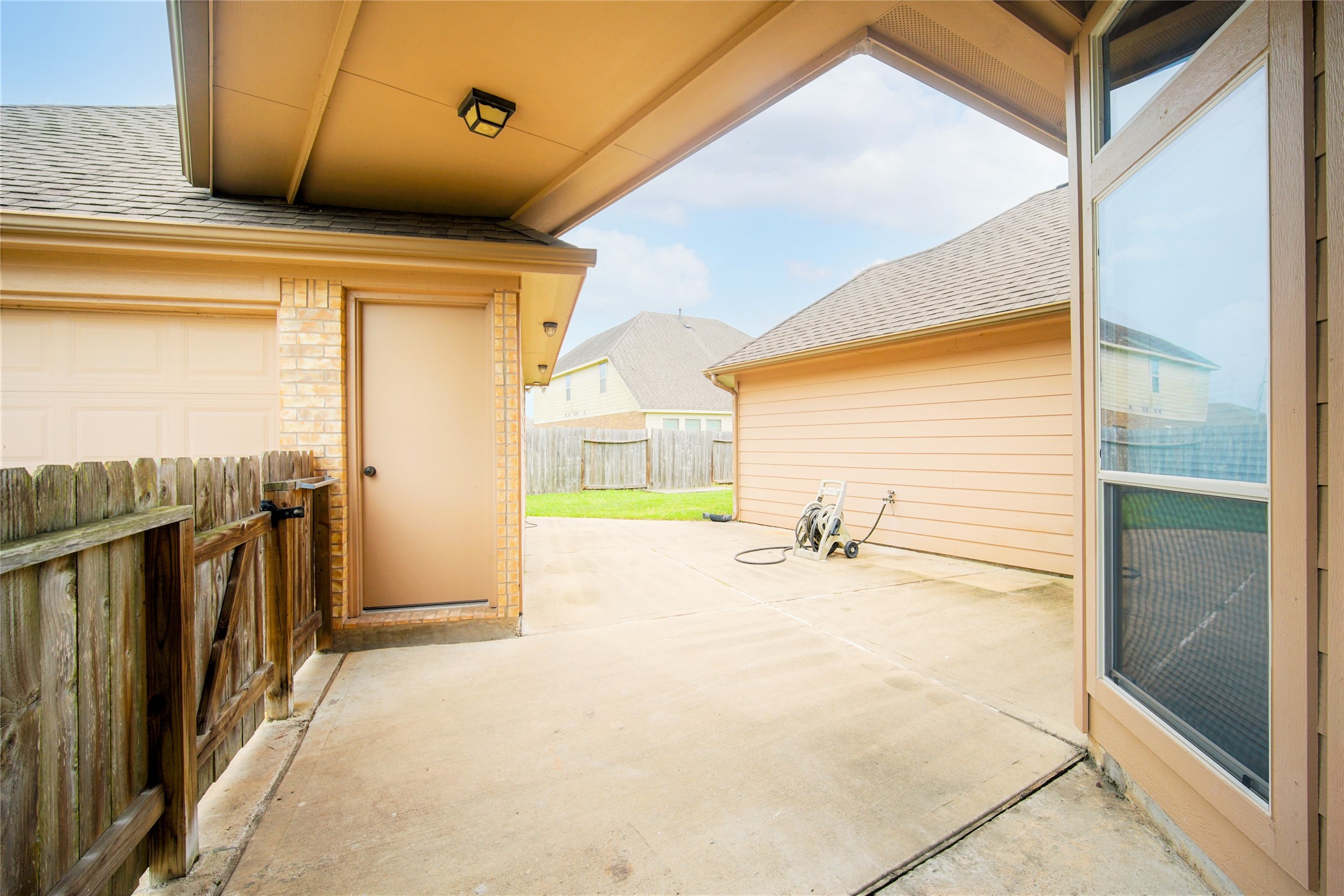 9323 Hillhaven Court Rosenberg, TX 77469 - Photo 35 of 37 a view of a living room with a large window