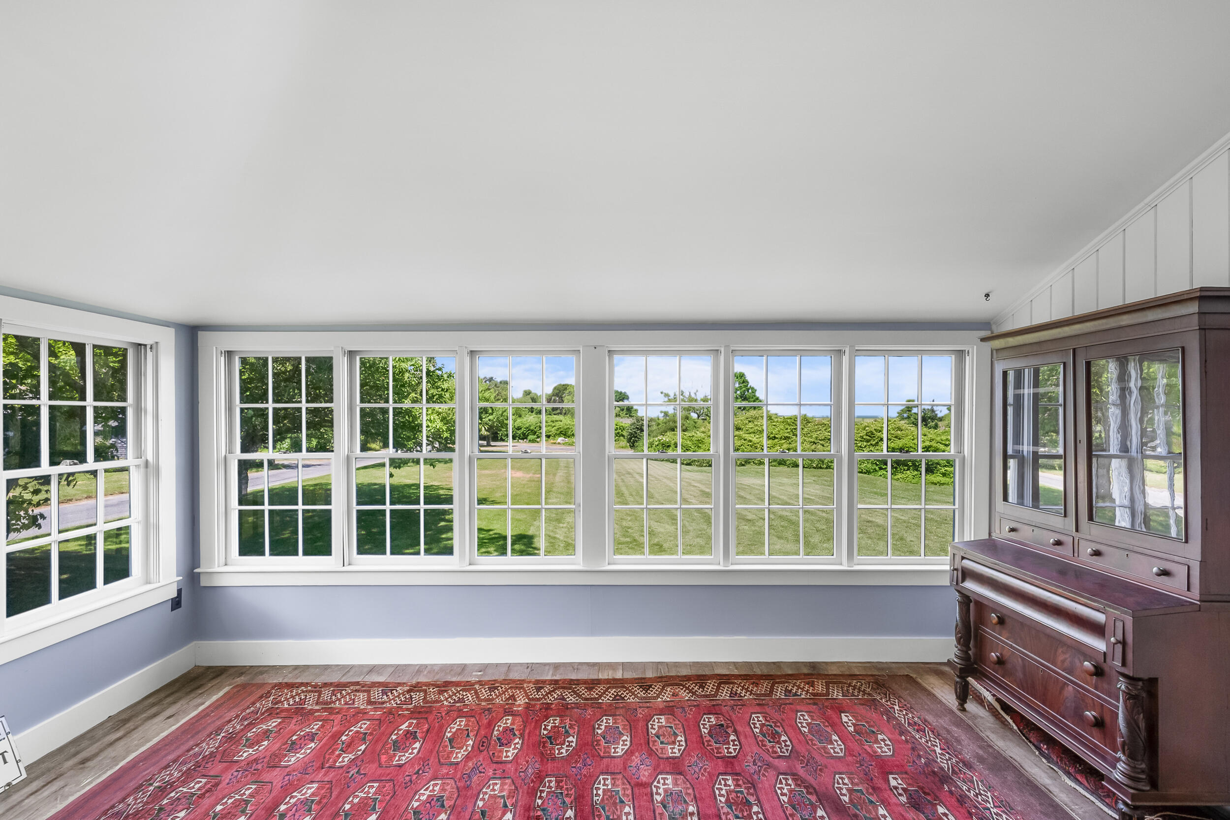56 Wharf Lane Yarmouth Port, MA 02675 - Photo 15 of 71 a view of wooden floor and windows in a room
