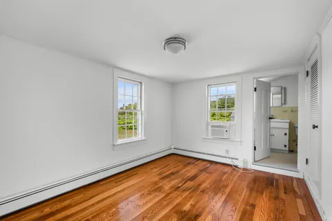 a bathroom with a sink a toilet and a bathtub
