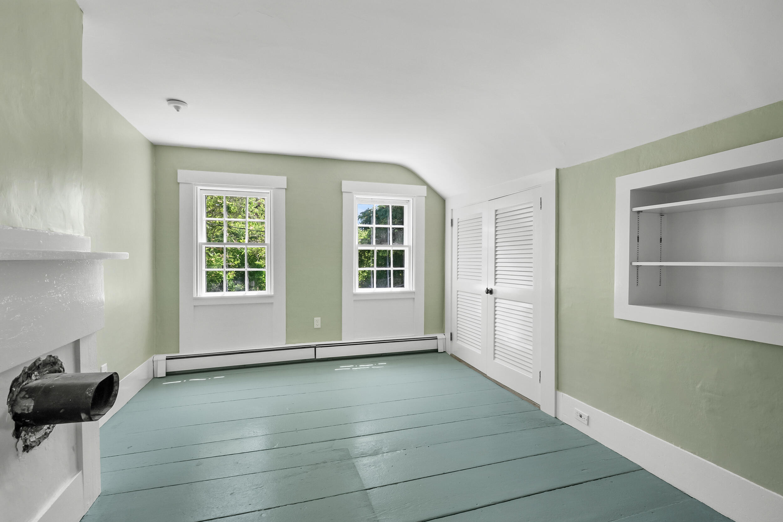 56 Wharf Lane Yarmouth Port, MA 02675 - Photo 42 of 71 a view of an empty room with a window and wooden floor