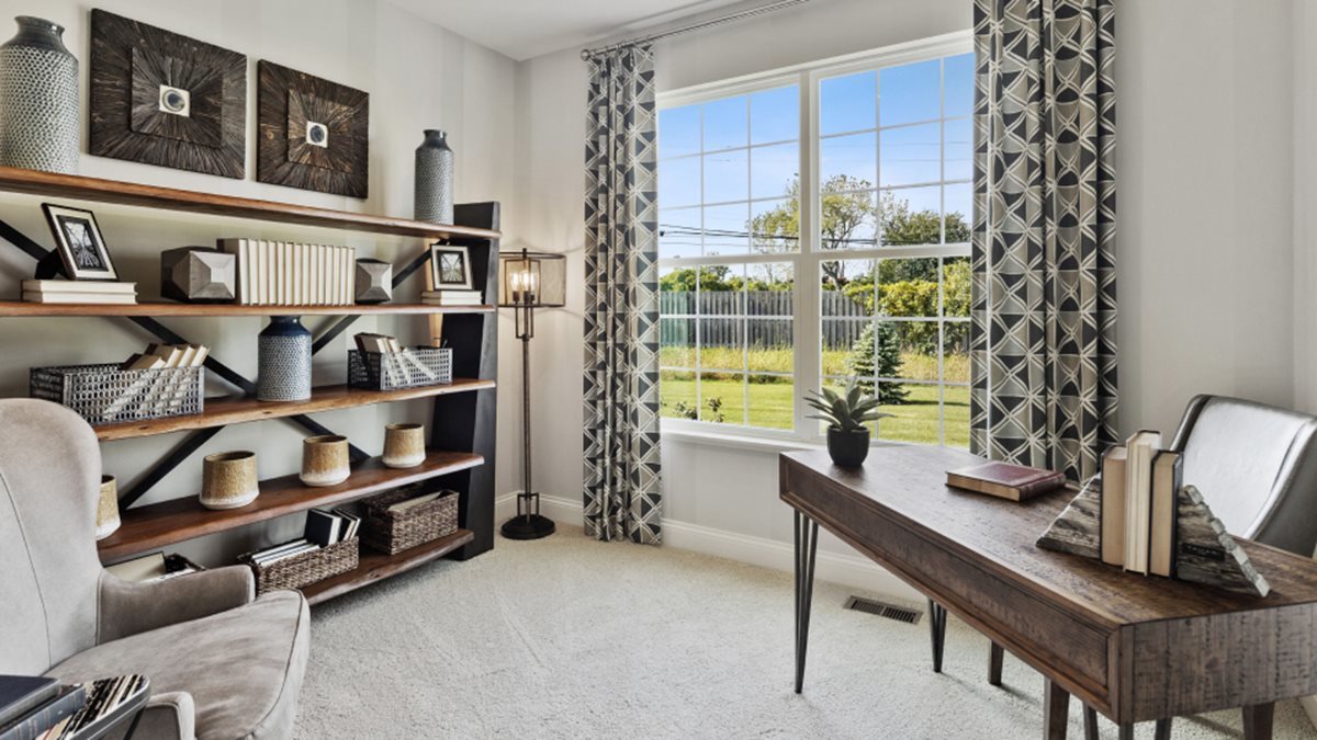 16228 Longcommon Lane Plainfield, IL 60586 - Photo 11 of 21 a room with furniture a rug and a window