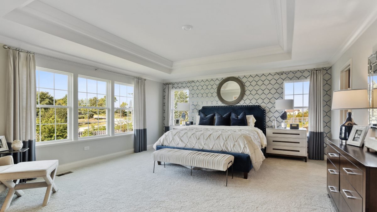 16228 Longcommon Lane Plainfield, IL 60586 - Photo 14 of 21 a bed room with a bed and chair