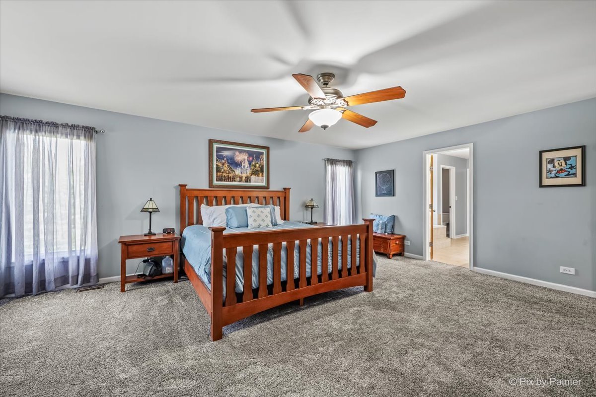 7104 Dove Way Cary, IL 60013 - Photo 29 of 82 a bedroom with furniture and a window