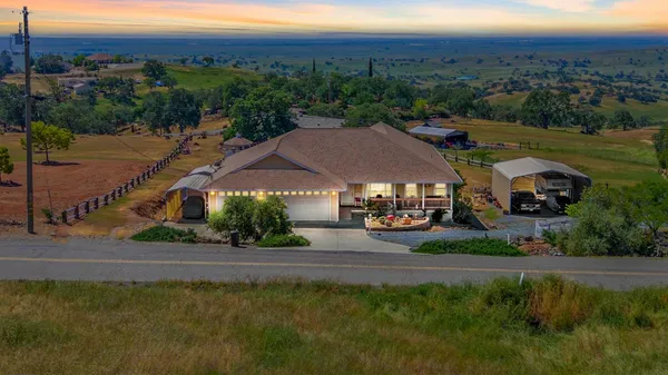 a view of a street with a building in the background