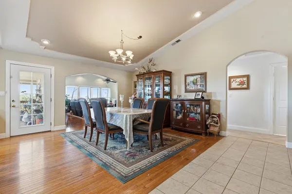 a view of a dining room with furniture