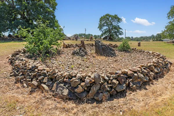 a aerial view of a house with a big yard
