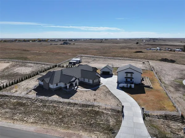 a view of a terrace with wooden floor