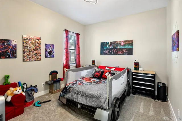 a bedroom with furniture and a bed