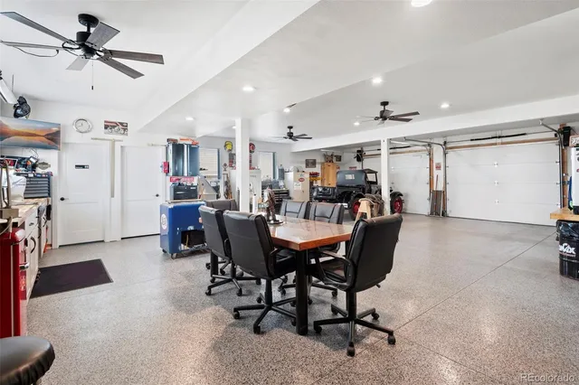 a view of a dining room and livingroom with furniture