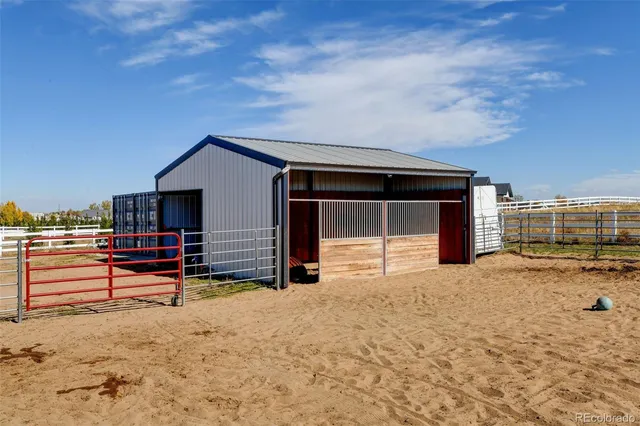 a view of a house with a snow in the yard