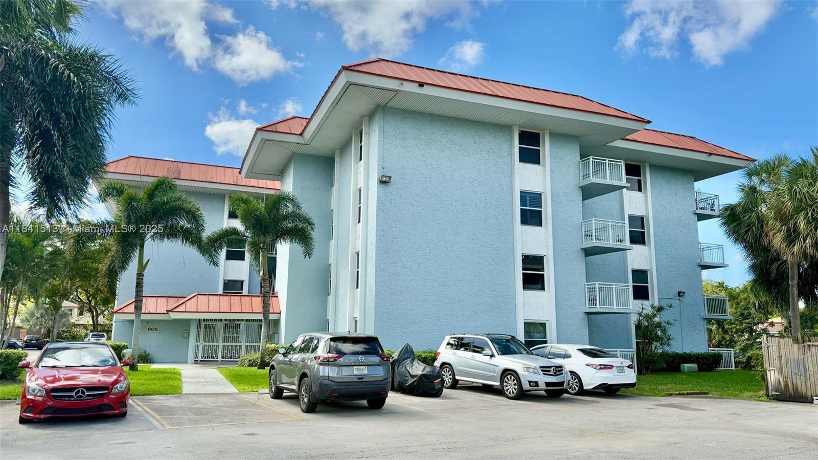 605 South Pine Island Road, Unit 405A Plantation, FL 33324 - Photo 13 of 17 a car parked in front of a building