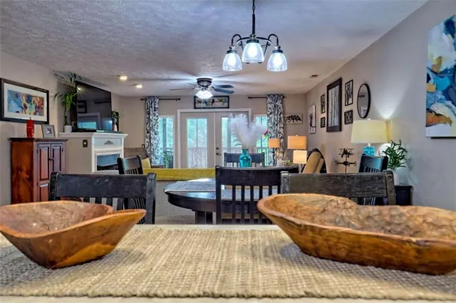 a bedroom with a bed couch and window