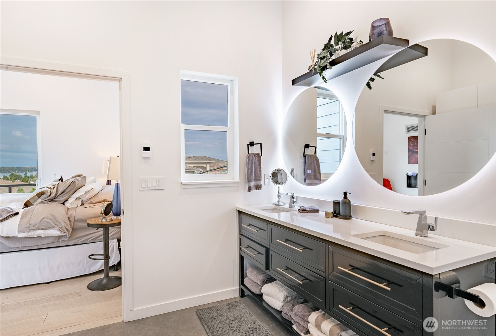 8068 Niska Road Blaine, WA 98230 - Photo 13 of 40 a bathroom with a sink vanity and mirror