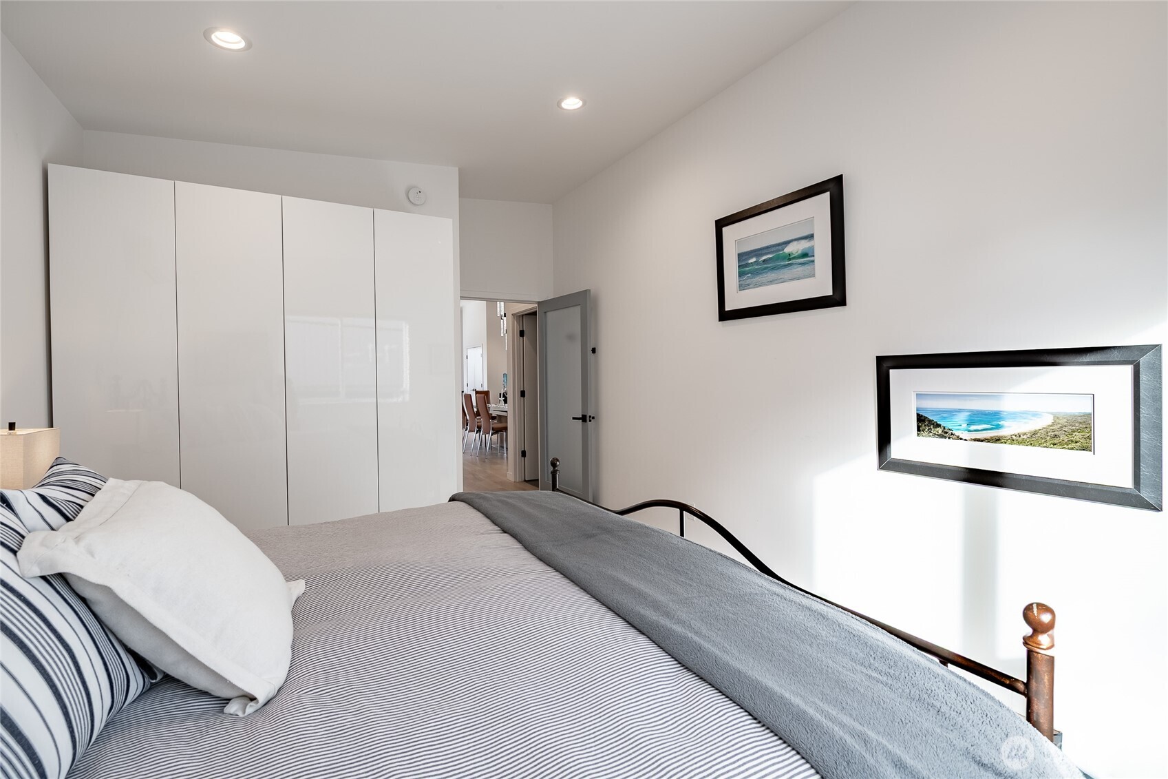 8068 Niska Road Blaine, WA 98230 - Photo 14 of 40 a bedroom with a bed and a painting on the wall