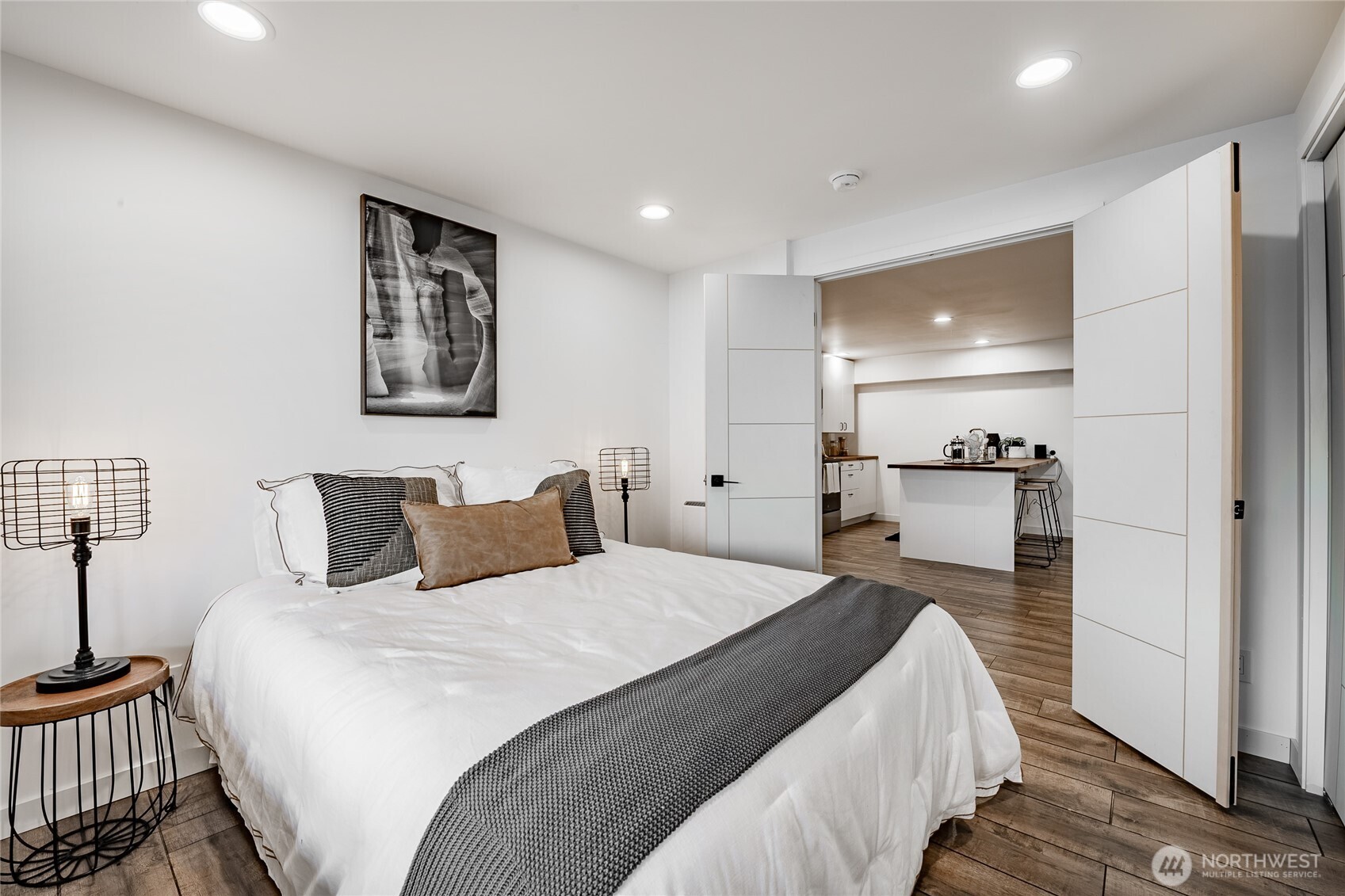 8068 Niska Road Blaine, WA 98230 - Photo 27 of 40 a bedroom with a bed and a mirror