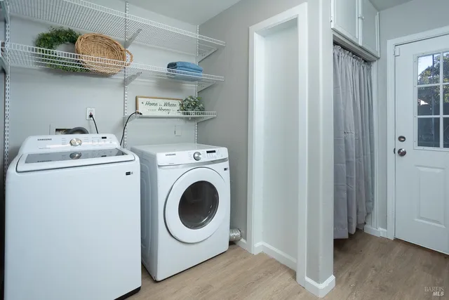 a view of livingroom with hardwood floor and yard