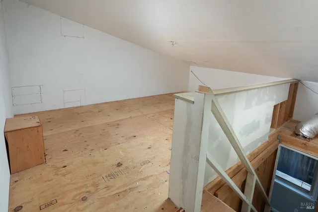 a view of a livingroom and a window