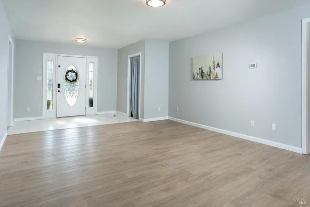 a view of a livingroom with a potted plant