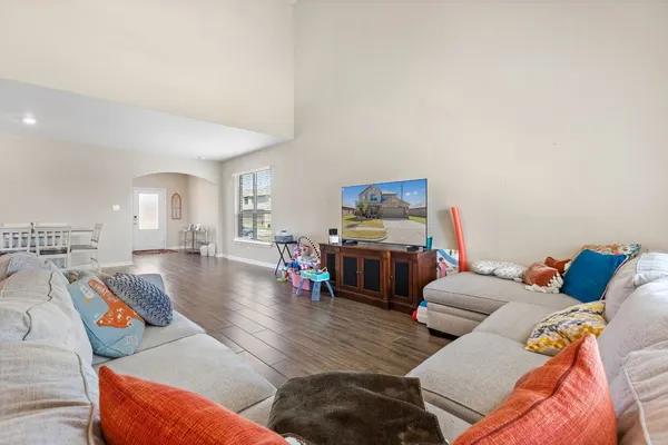 a living room with furniture and a couch