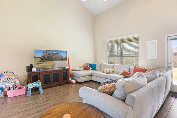 a living room with furniture and a window