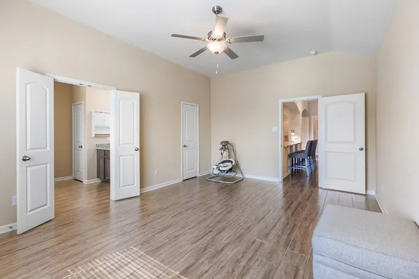 a view of a livingroom with wooden floor