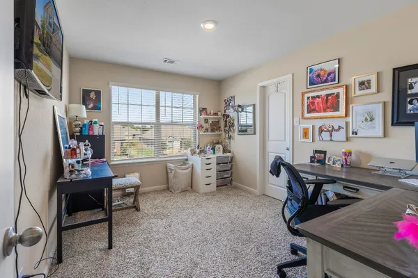 a room with furniture a window and a table
